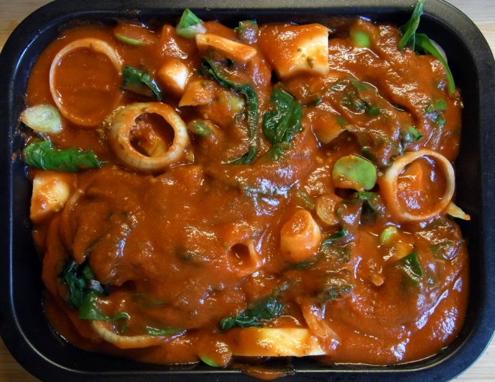 Cover in passata and bake until courgette is al dente